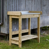 oppottafel opot tafel bloemstukken maken tuinierstafel tafel werktafel voor in de tuin potten planten goed hout gaat lang mee FSC gekeurd  altijd handig